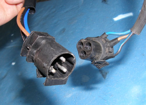 (Image: Original auxiliary fan electrical connectors detached)