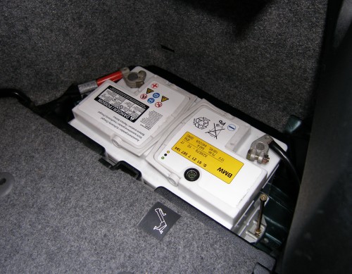 (Image: New battery installed in trunk)