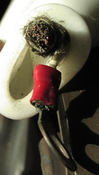 (Image: Closeup of broken main bus feeder wire)