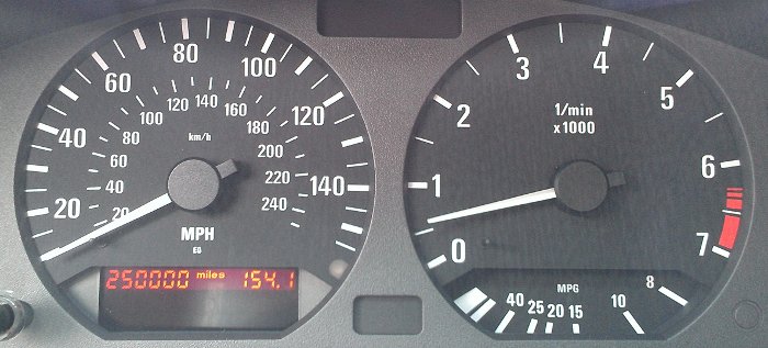 (Image: Picture of E36 gauge cluster showing 250000 miles on odometer