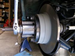 (Image: Using the BMW special toolset to install the axle shafts)