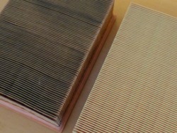 (Image: Engine air filter comparison - new vs. 30K miles in service)