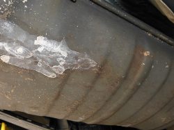 (Image: A wide angle look at the long crack in the exhaust)