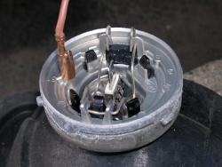(Image: Wiring cap removed from rear of foglamp reflector housing)