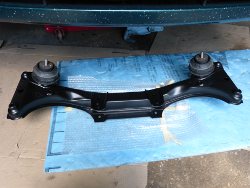 (Image: Front subframe with engine mounts resting on top prior to installation)