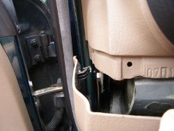 (Image: Closeup of barb on inside edge of dash panel)