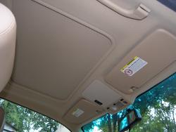 (Image: Shot of the front portion of the headliner with visors installed)