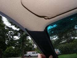 (Image: Closeup of how black A pillar looks contrasted with headliner)