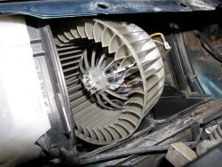 (Image: Technique used to install right side squirrel cage on new blower)