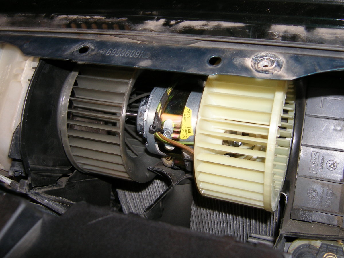 (Image: Closeup of new blower motor installed and wired)