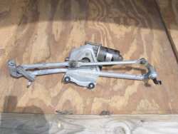 (Image: Wiper motor assembly removed from vehicle)
