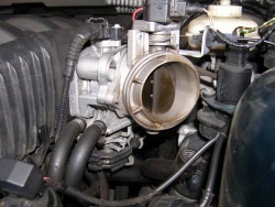 (Image: Closeup of ASC throttle body with intake boot removed)