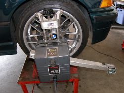 (Image: Alignment sensor installed on front right wheel)