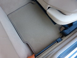 (Image: Rear passenger footwell with new carpet installed)