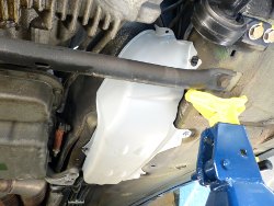(Image: Perspective shot showing new fuel filter cover installed)