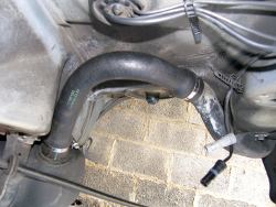 (Image: New fuel tank filler port hose installed)