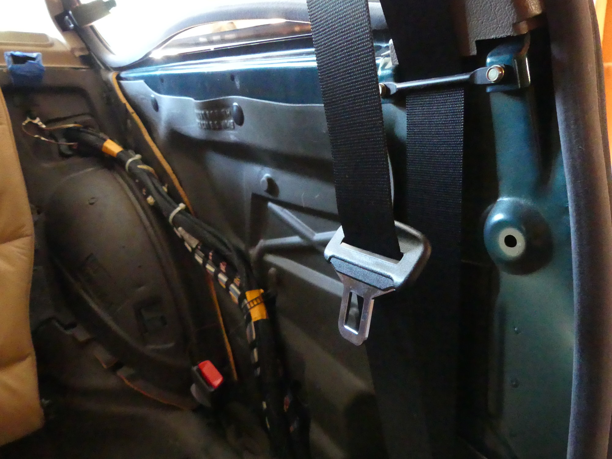 (Image: New driver side seat belt mechanism installed)