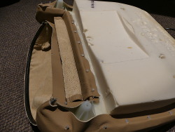 (Image: Showing bottom of seat base foam with new cover installed)