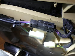 (Image: Closeup of wiring connectors on bottom of seat base)