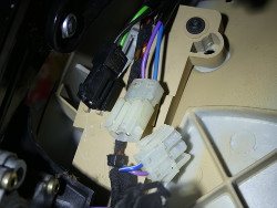 (Image: Closeup of wiring connectors on bottom of seat base)