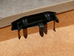 (Image: Rear of tilt lever fairing showing plastic barbs)