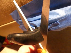 (Image: Using scissors to extract tilt lever handle)