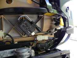 (Image: Closeup of front passenger seat occupancy sensor module)