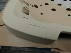 (Image: Top of plastic seat base being painted)