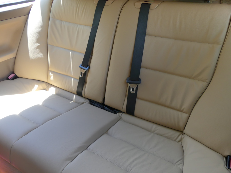 (Image: Wide view of the rear seats with new leather installed)