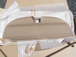 (Image: New parcel shelf in beige removed from the box)