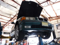 (Image: Perspective shot of E36 up on lift during July 2012 alignment)