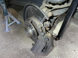 (Image: Showing left side rear brake disassembled)