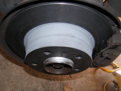 (Image: Minimum thickness stamped on rear rotor of 8.4mm)