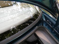 (Image: Closeup of new lower rear window seal installed)