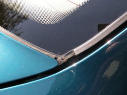 (Image: Closeup of rear window trim disintegration)