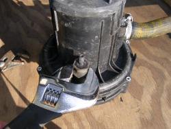 (Image: Removing secondary air pump isolators with adjustable wrench)