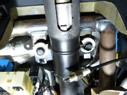 (Image: Closeup of the replacement steering column mounting bolts installed)