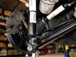 (Image: Shock fastened to trailing arm)