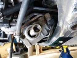 (Image: Steering rack shaft exposed with inner tierod removed)