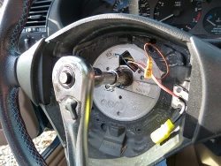 (Image: Showing ratchet configuration required to remove center bolt)
