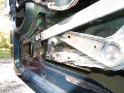 (Image: Closeup of rear slide rail assembly)