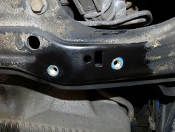 (Image: Closeup of nutserts installed in subframe)