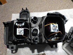 (Image: ZKW Euro Ellipsoid headlight assembly back with covers removed)