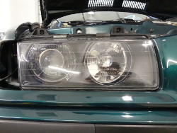 (Image: Closeup of the passenger headlight aligned to the body)