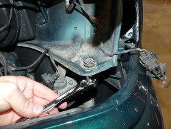 (Image: Removing stubborn adjuster from below using a ratchet)