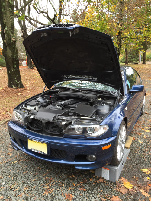 (Image: E46 up on ramps in prep for oil change)