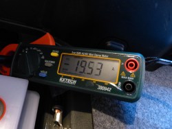 (Image: Clamp meter showing 20 amp load during prestart mode)