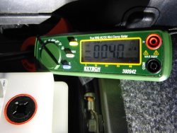 (Image: Clamp meter showing normal sleep mode current consumption)