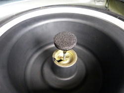 (Image: Closeup of spare tire insert and foam riser)