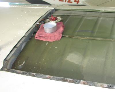 (Image: Fuel stain apparent on top of tank)